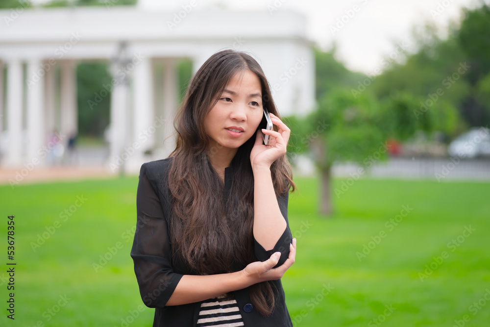 woman talking on a smartphone woman talking on a smartphone