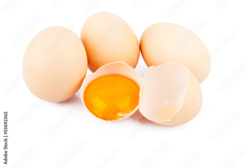 Chicken raw eggs, whole and broken on white, food photo Chicken raw eggs, whole and broken on white, food photo