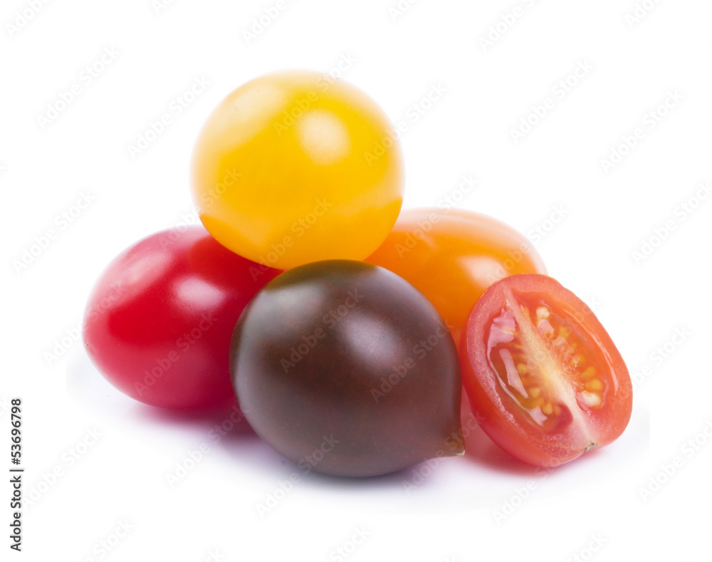 colored cherry tomatoes on a white background colored cherry tomatoes on a white background