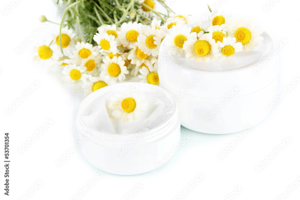 Cream with chamomile isolated on white Cream with chamomile isolated on white
