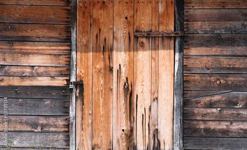 Wooden wall and doors locked