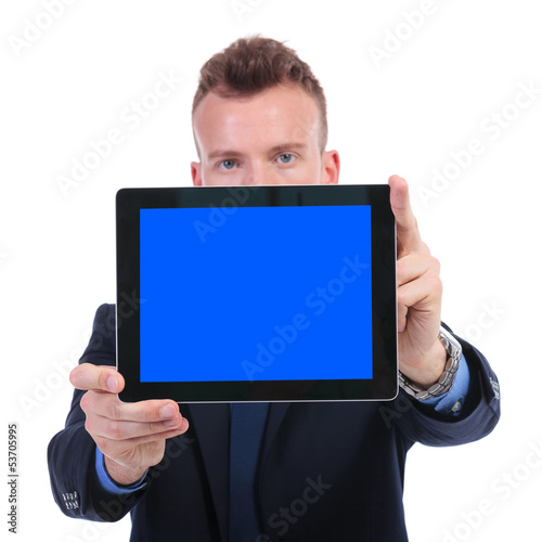 business man presents empty screen tablet