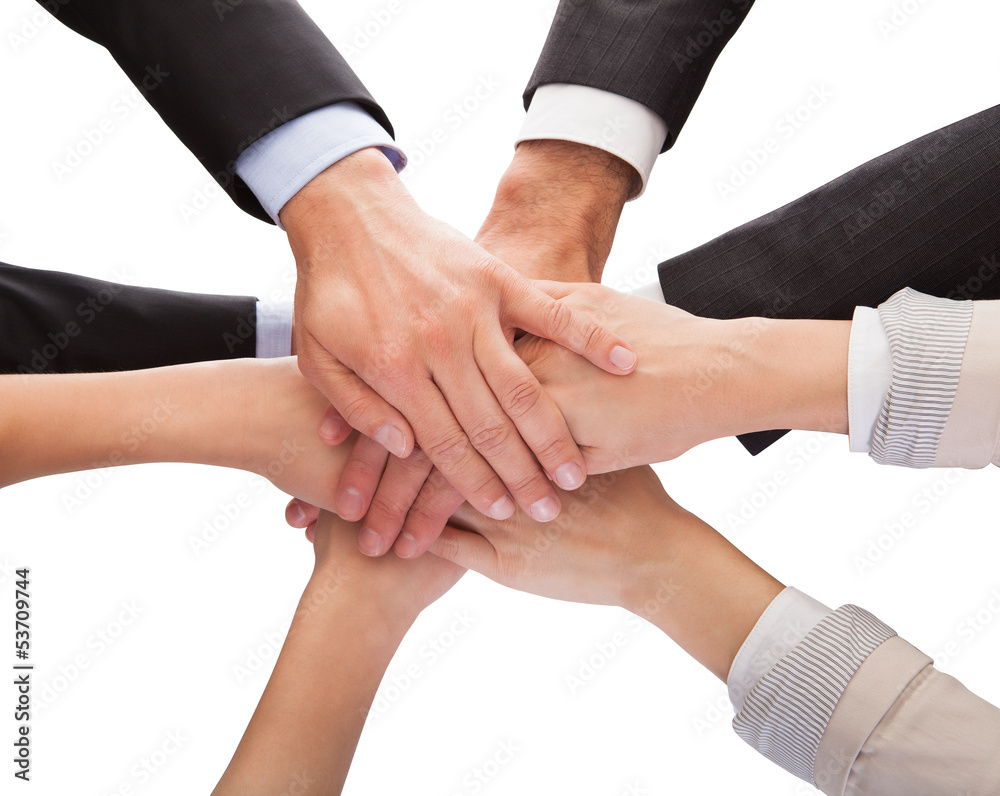 Businesspeople Stacking Their Hands Together Businesspeople Stacking Their Hands Together