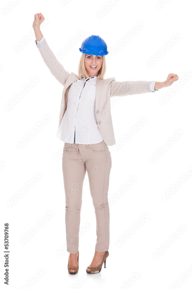 Portrait Of Female Architect With Arms Raised Portrait Of Female Architect With Arms Raised