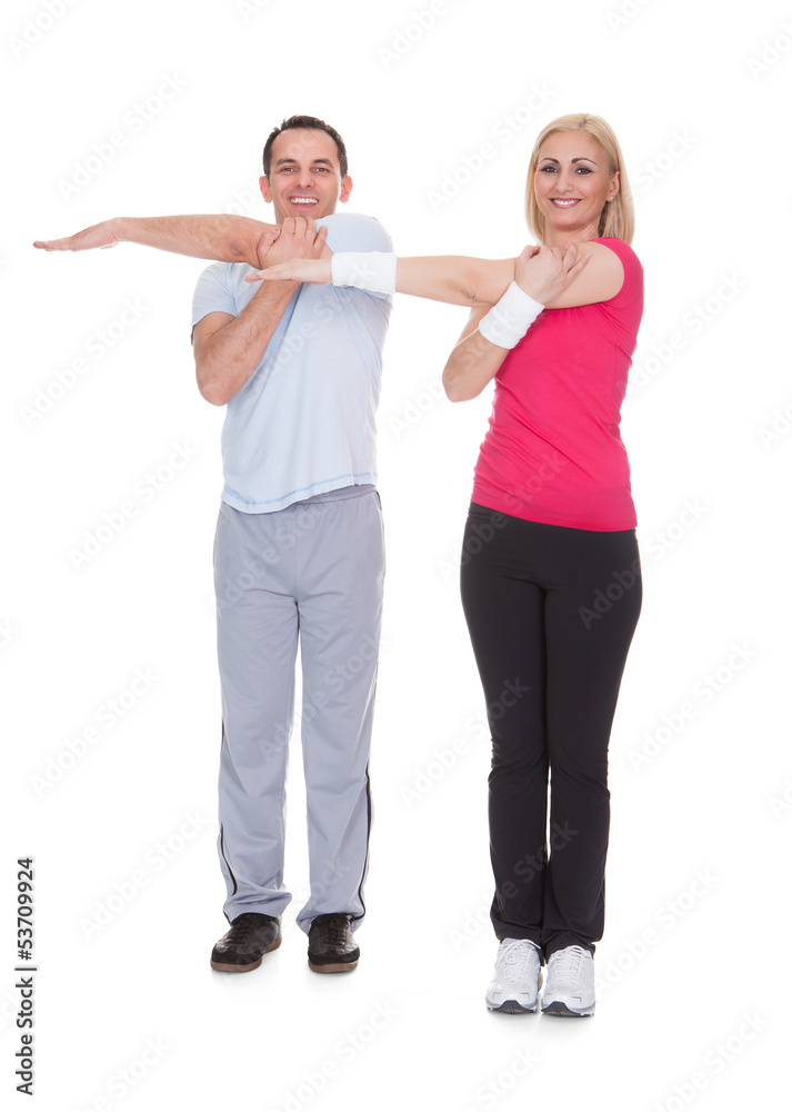 Portrait Of Couple Exercising