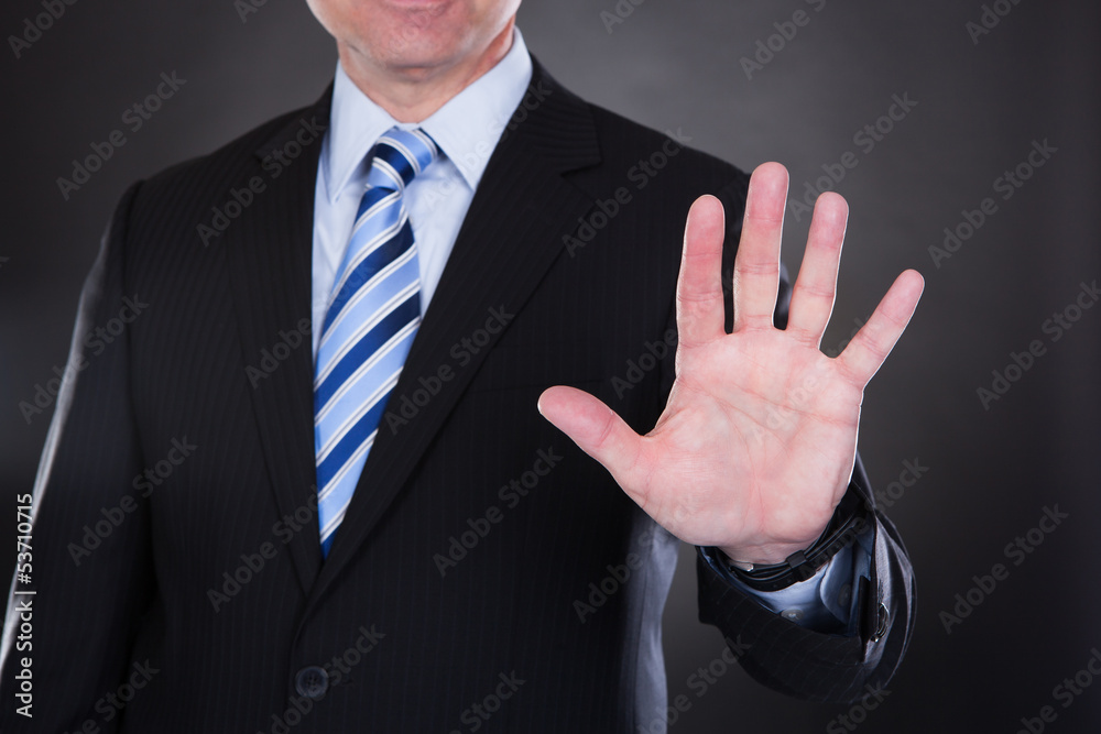Businessman touching the screen Businessman touching the screen