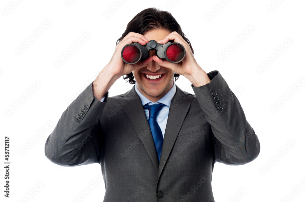 Young businessman hunting success Young businessman hunting success