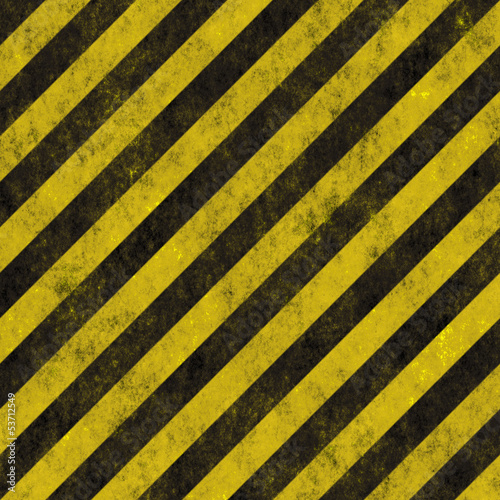 Old grungy yellow hazard stripes seamless texture