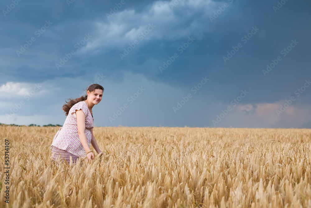 Young pregnant woman on wheat field Young pregnant woman on wheat field