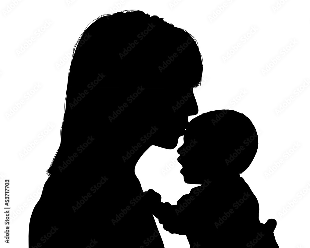 mother kissing her newborn child silhouette