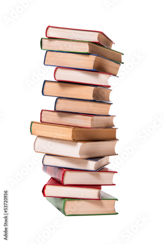 Multicolored books stack isolated on white background.