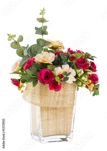 Bouquet of rose and jasmine in glass vase