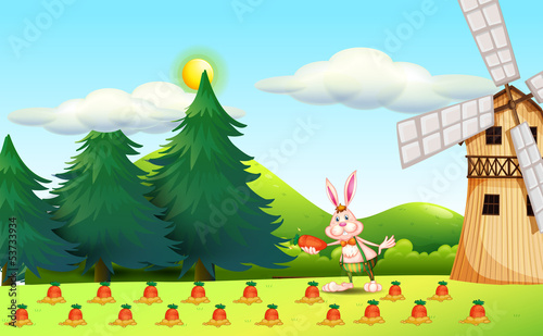 A rabbit planting carrots photo