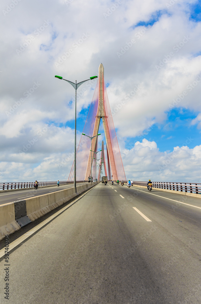 Fototapeta premium The top of the cable-stayed bridge in the cloud blue sky