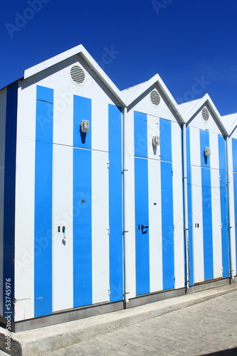 Blue and white fishermen's houses in Cascais, Portugal © anasztazia