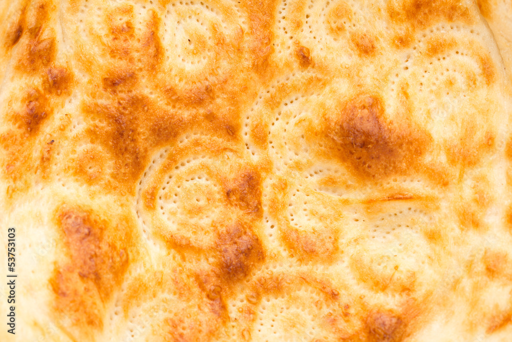 background of a crust of bread. macro background of a crust of bread. macro