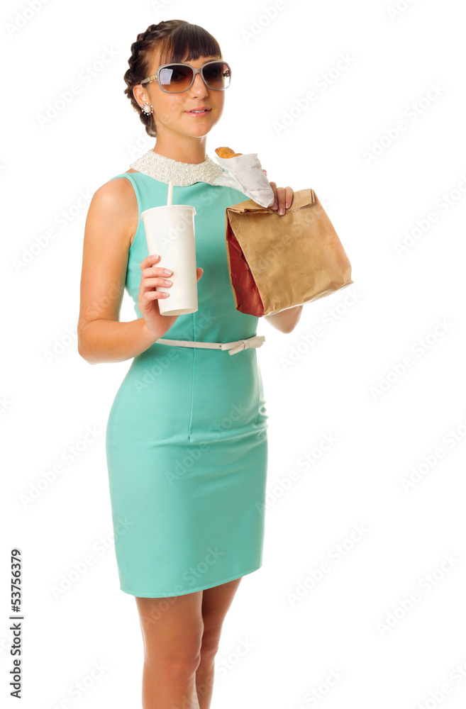 Glamorous girl in turquoise dress holds snacks Glamorous girl in turquoise dress holds snacks