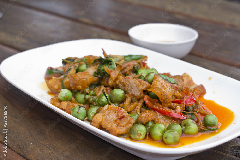 Thai food, Pork, Spicy Boar mixed with spices on plate