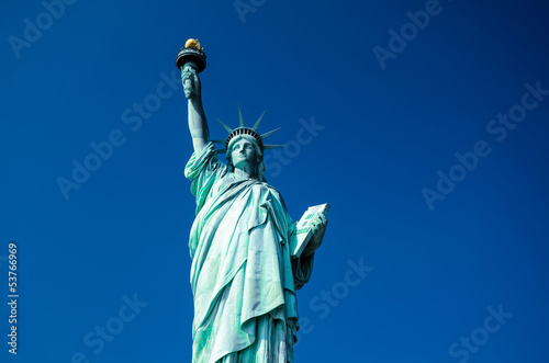 Statue of Liberty on blue clear sky