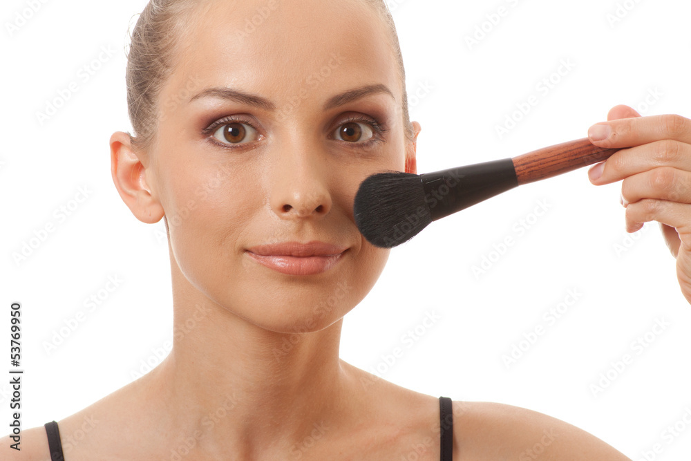 Pretty adult woman making make-up, isolated on white Pretty adult woman making make-up, isolated on white