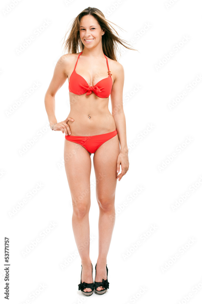 Full length woman in bikini isolated on white