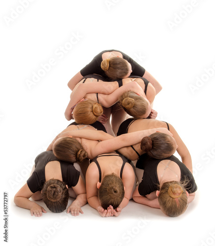 Photography Pile of Dancers Bodies in Modern Pyramid Staircase