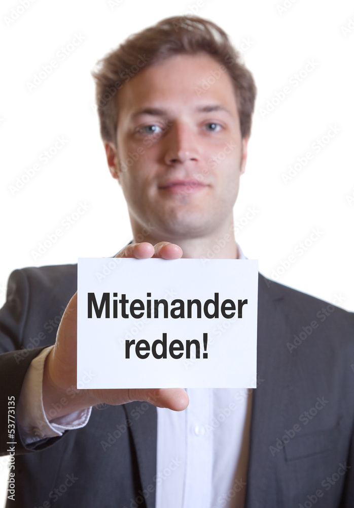 Mann im Anzug mit Karte MITEINANDER REDEN! Mann im Anzug mit Karte MITEINANDER REDEN!