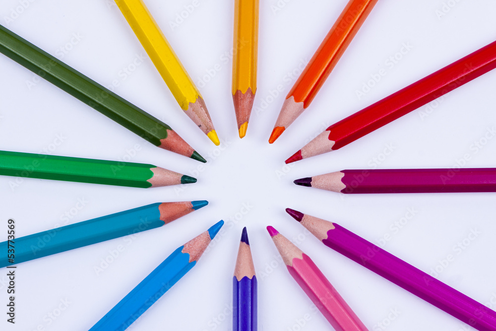 Colourful crayons on white background.