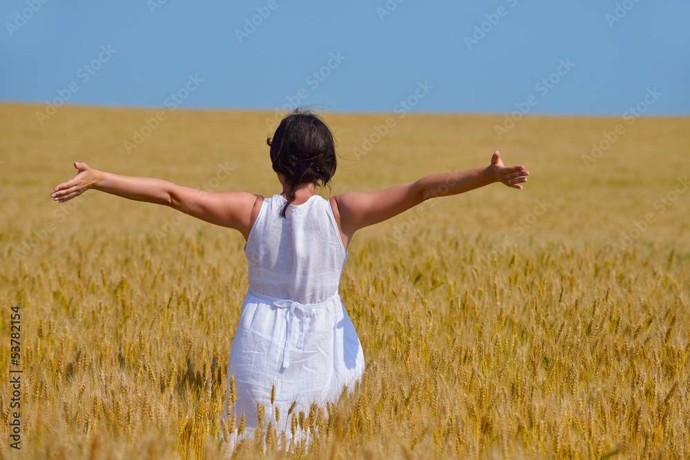 young woman in wheat field at summer young woman in wheat field at summer