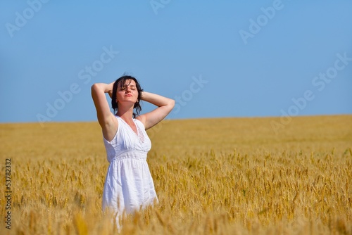 young woman in wheat field at summer © .shock