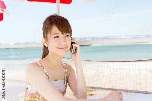 Beautiful young woman relaxing in the beach
