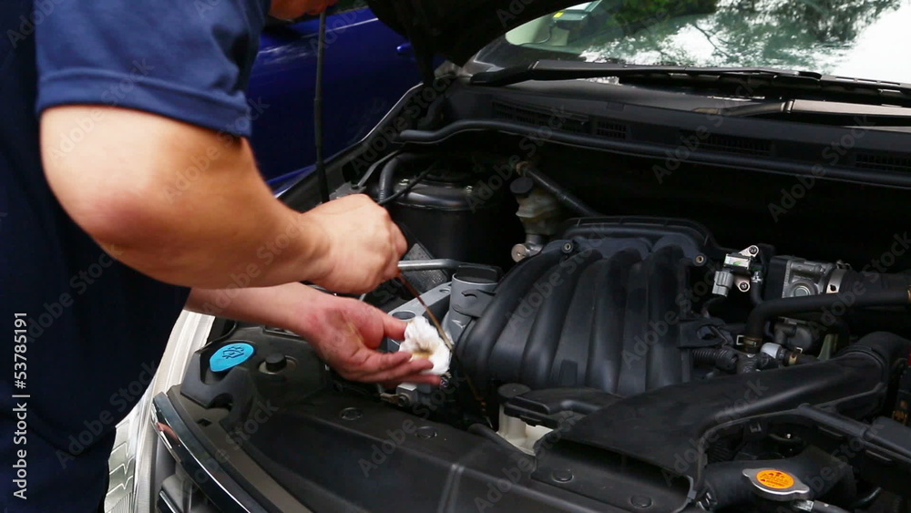 Checking engine oil Checking engine oil