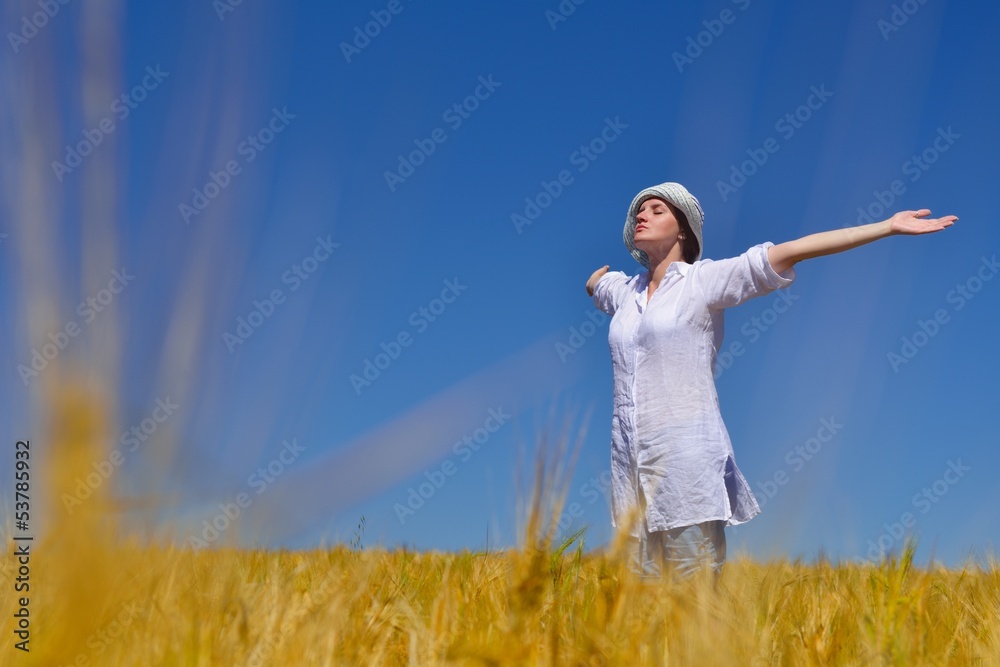 young woman with spreading arms to sky young woman with spreading arms to sky