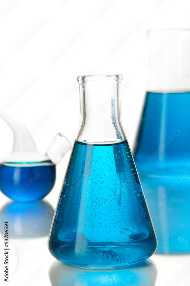 Test tubes with colorful liquids isolated on white Test tubes with colorful liquids isolated on white