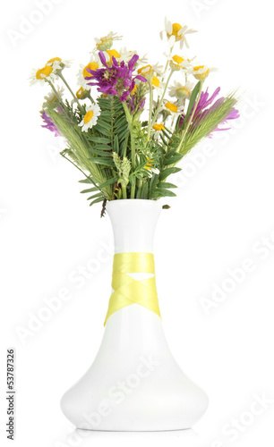 Beautiful wild camomiles in .vase, isolated on white © Africa Studio