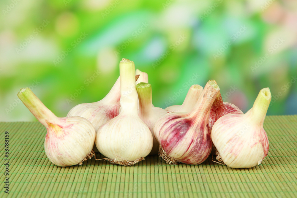 Fresh garlic, on bright background