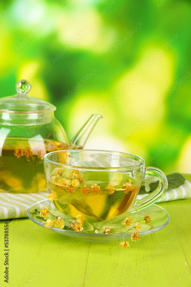 Kettle and cup of tea with linden Kettle and cup of tea with linden