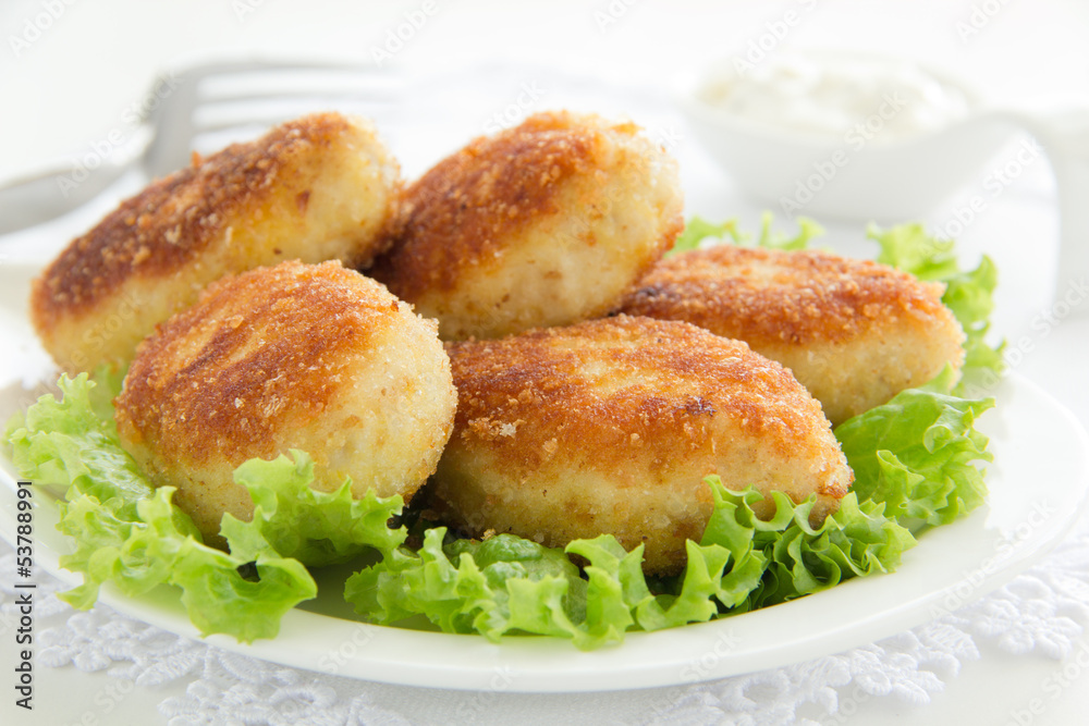 Chicken cutlets with salad.