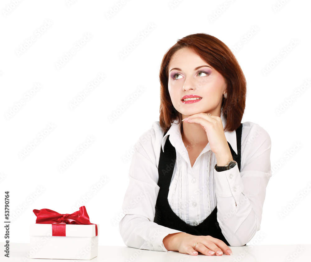 business woman with gift box with red bow sitting at the desk business woman with gift box with red bow sitting at the desk