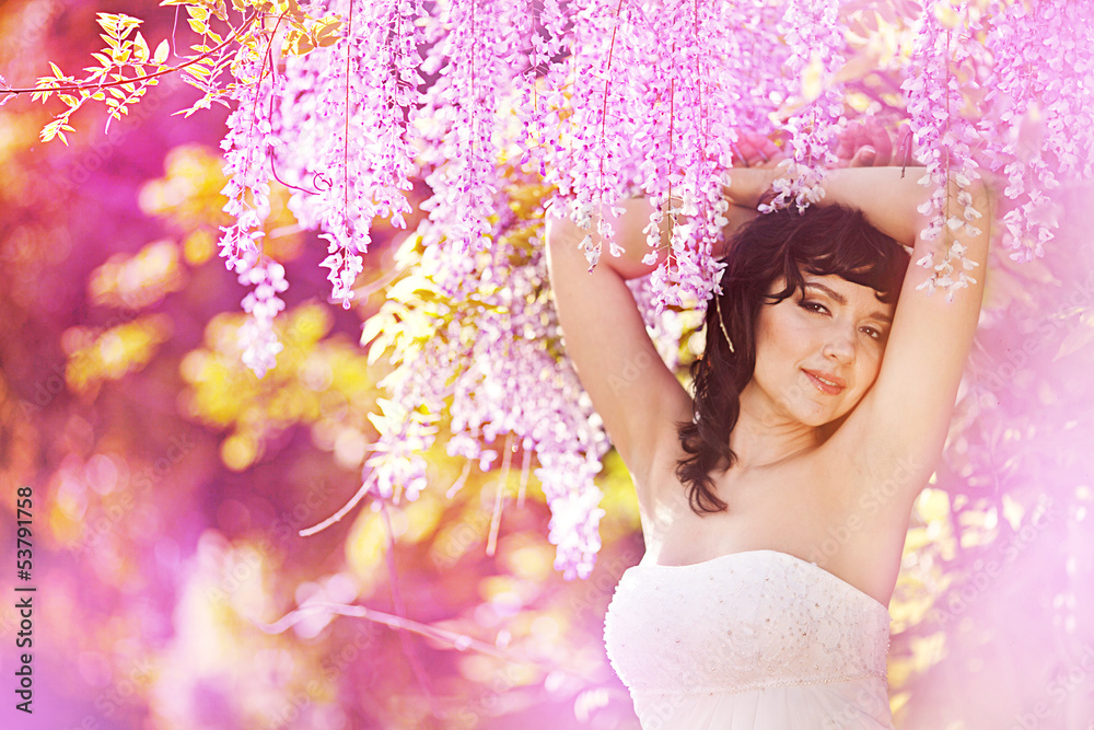 beautiful girl in the garden of a pink acacia beautiful girl in the garden of a pink acacia