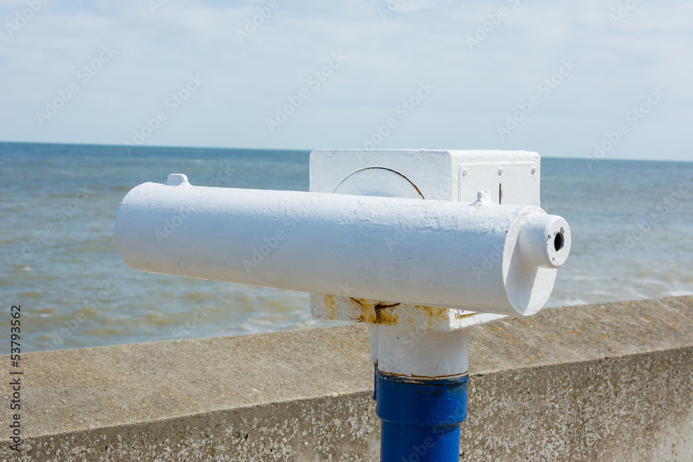 Telescope on seaside promenade. Telescope on seaside promenade.