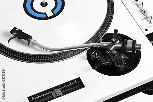 Closedup dj turntable with white vinyl