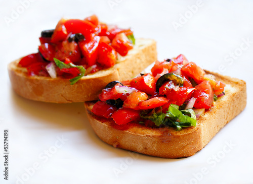 Bruschetta with tomato and olives