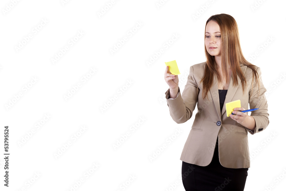 Businesswoman looking at a sticker isolated on white background Businesswoman looking at a sticker isolated on white background