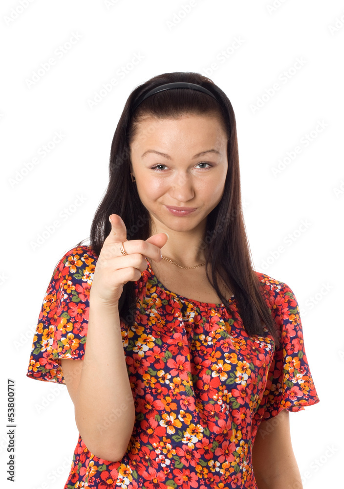 Close-up of young woman pointing at camera Close-up of young woman pointing at camera