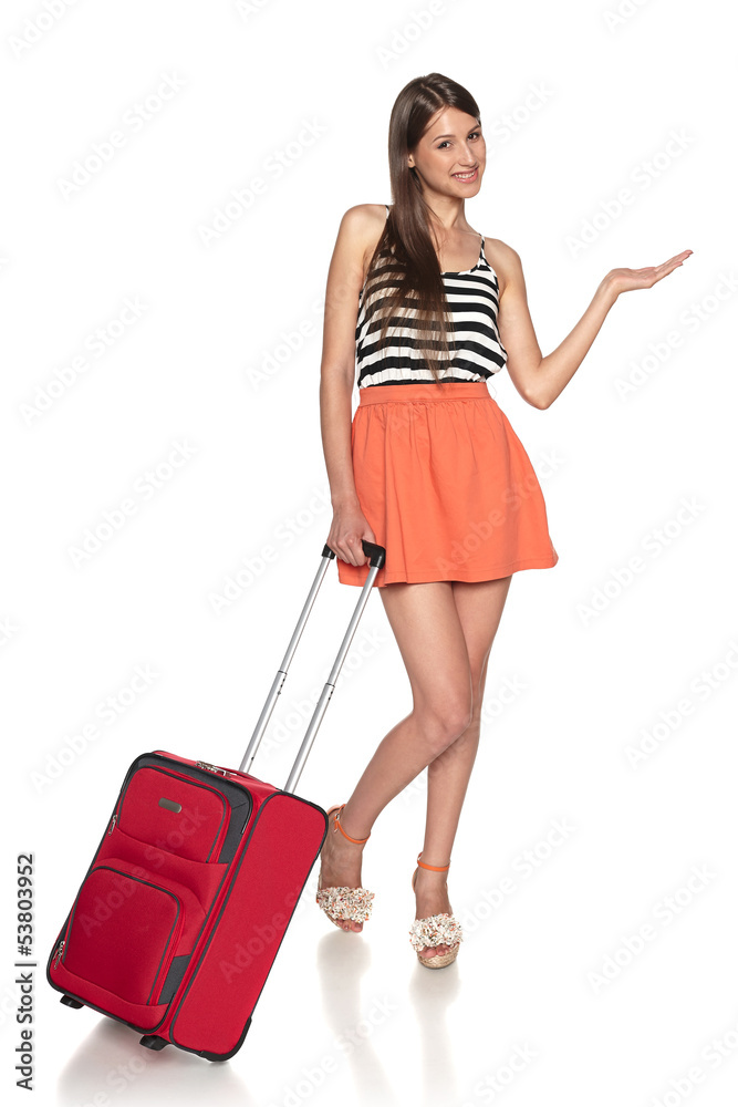 Female with red suitcase holding blank copy space on palm Female with red suitcase holding blank copy space on palm