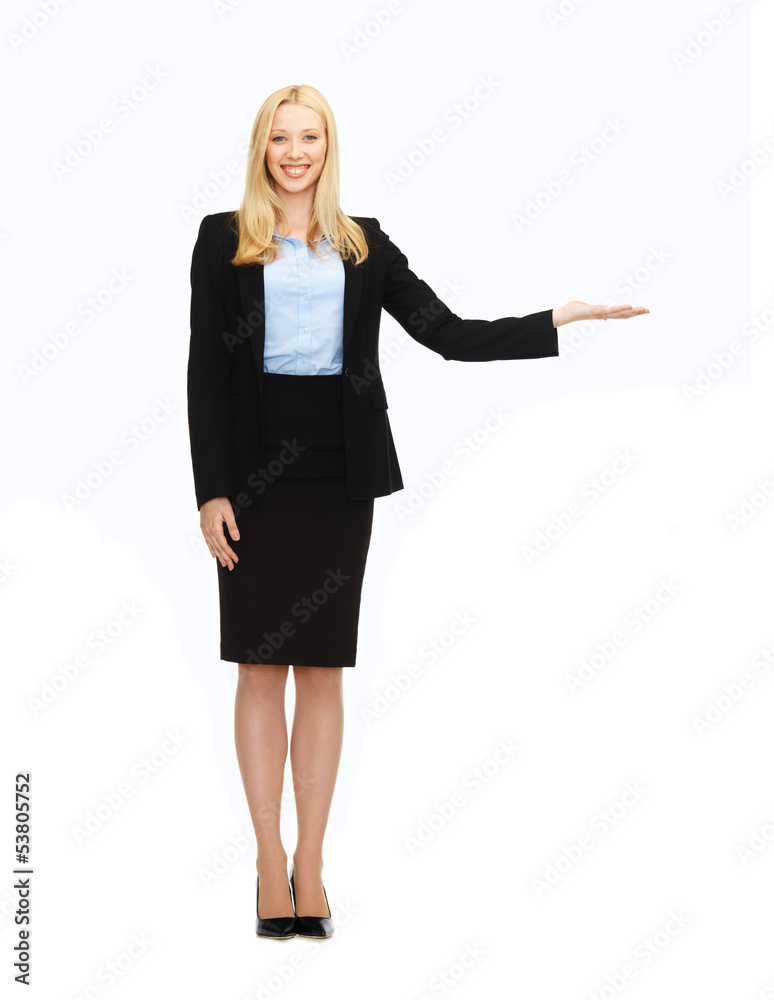 woman showing something imaginary on her hand woman showing something imaginary on her hand