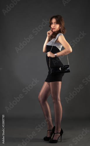 young girl with a handbag