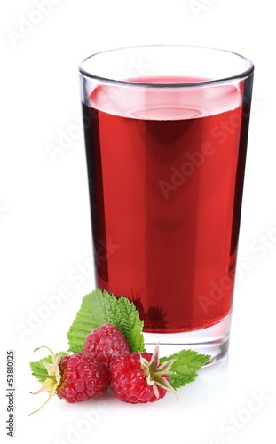 ripe raspberry with green leaf and in juice