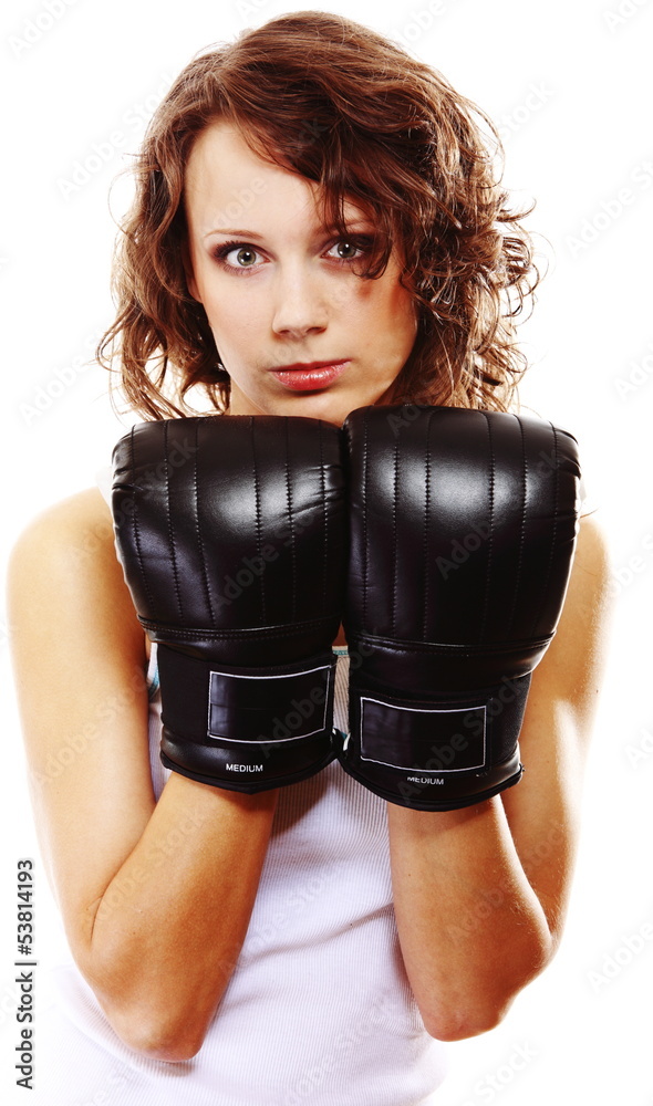 Fit woman boxing - isolated over white